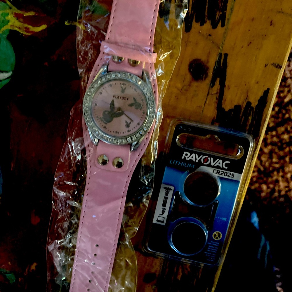 Playboy watch with extra batteries